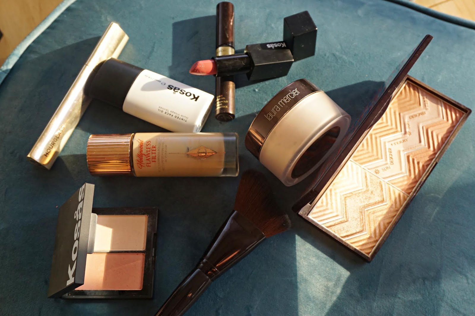 Late Summer Newness Including the Hair Ritual Volume Spray, Kosas Tinted Face Oil, Sisley-Paris Phyto Lumiere and Laura Mericer Setting Powder in Glow